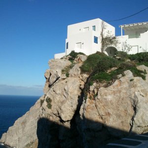 Overhanging houses along the coast